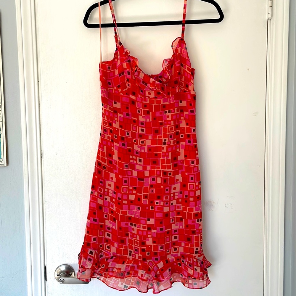 Stunning GEORGIOU Studio sheer dress with ruffles in red and pink tones.